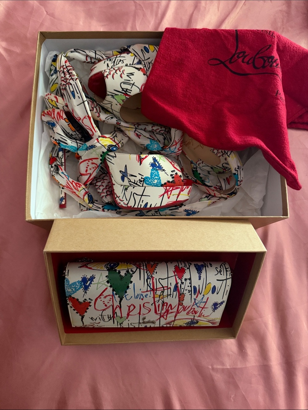 Christian Louboutin White Graffiti Print Wedge Sandals and clutch bag